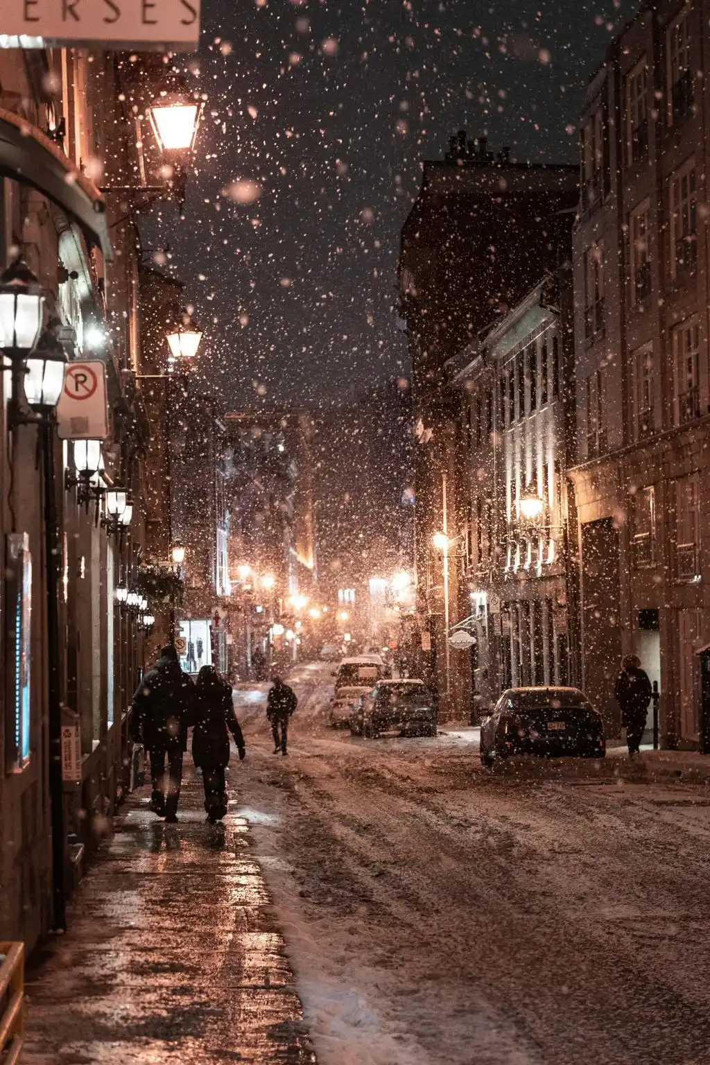 Snowy City Street Night Warm Lights