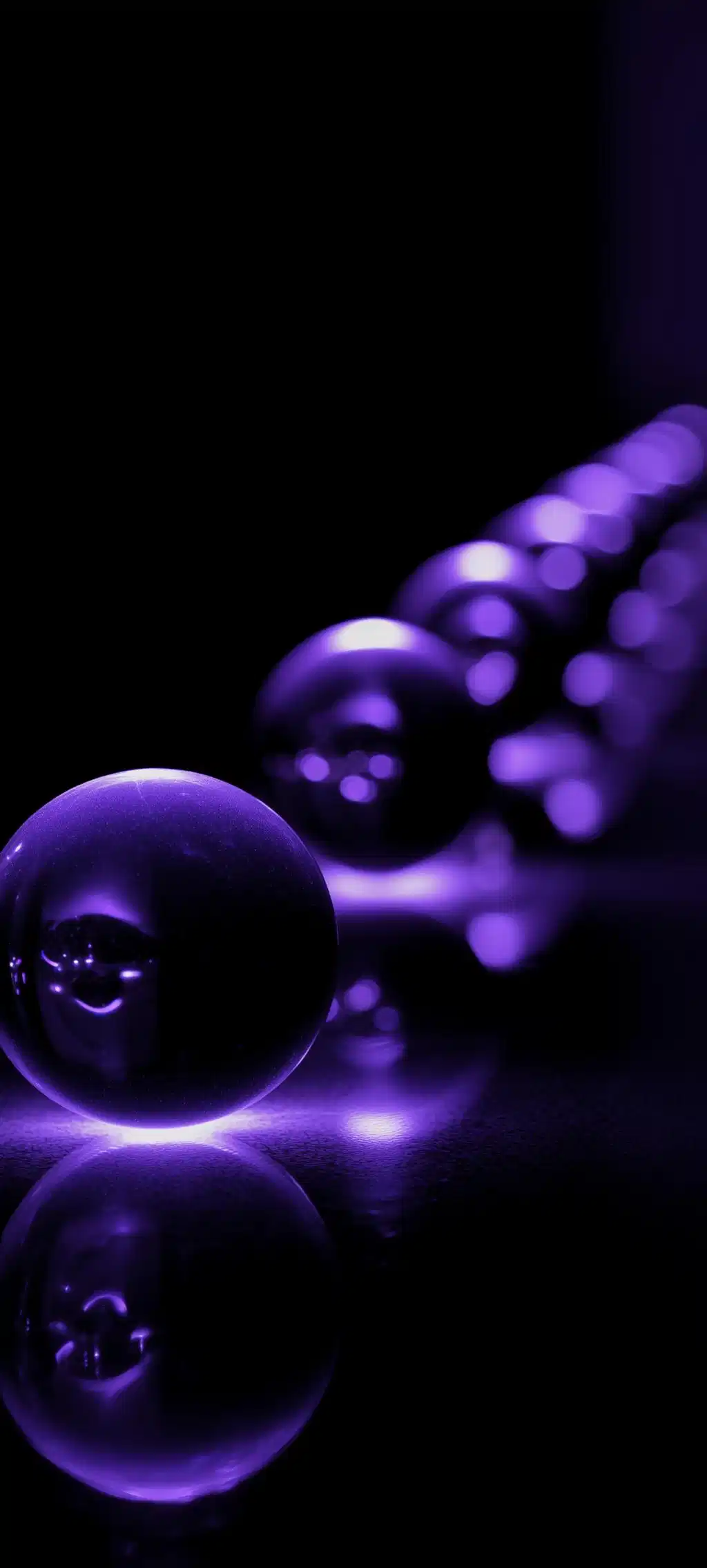 Glowing Purple Orbs In Line
