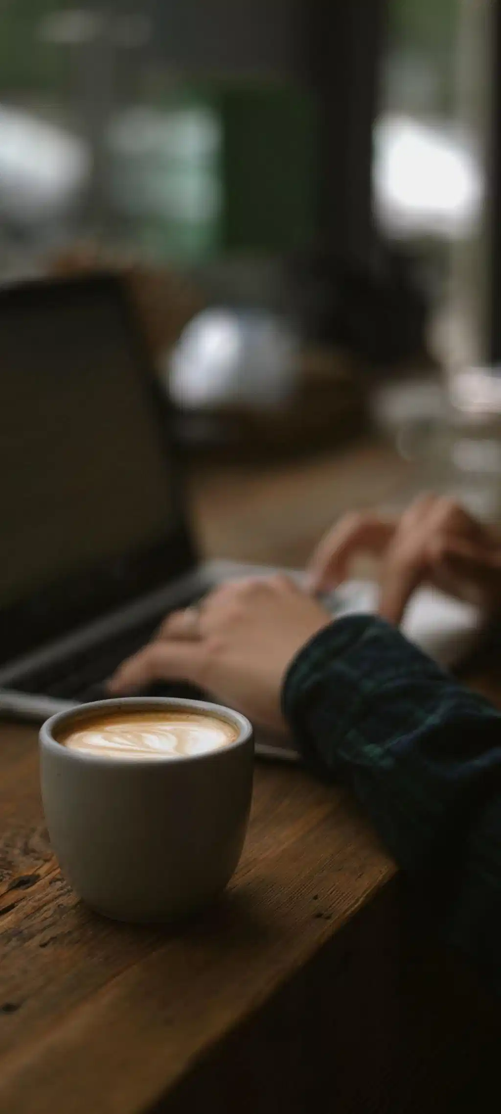 Cozy Coffee Cup Laptop Blurred Background
